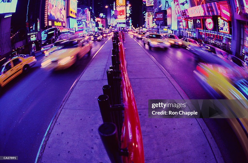 Traffic in Times Square at night (blurred motion, fish eye)