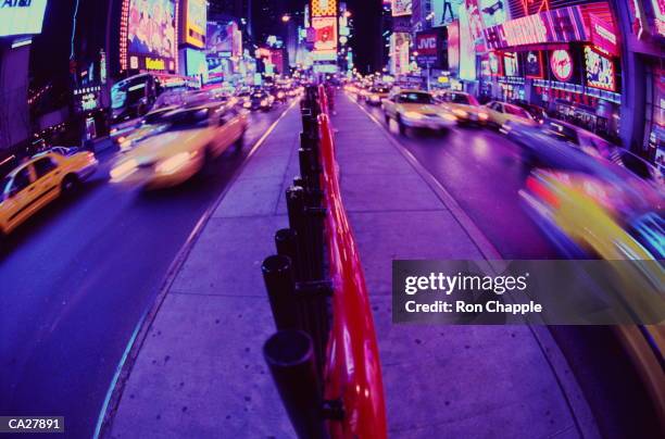 traffic in times square at night (blurred motion, fish eye) - upper midtown manhattan stock pictures, royalty-free photos & images