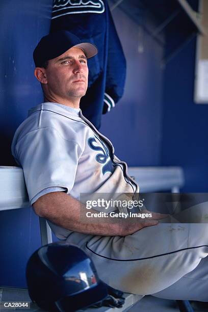 baseball player in dugout - dugout stock pictures, royalty-free photos & images