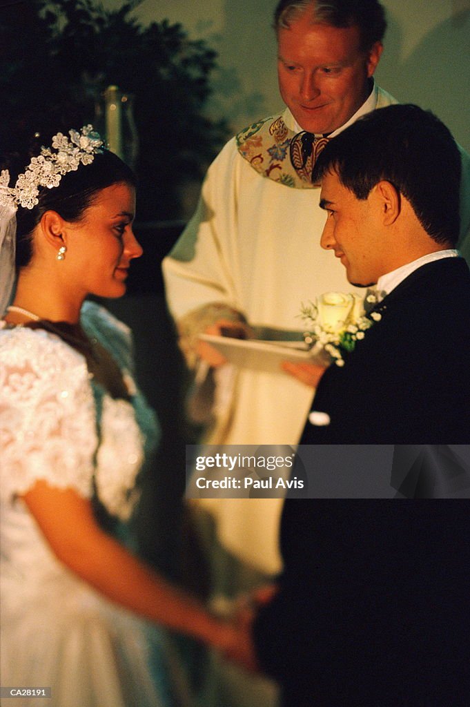 Couple exchanging wedding vows