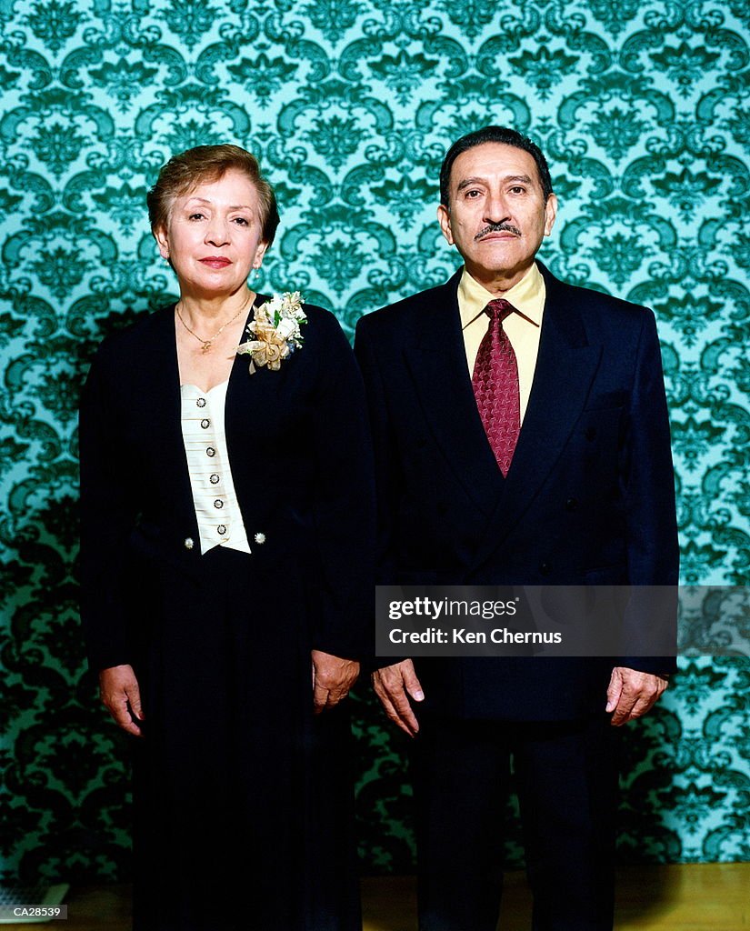 Mature couple in formal wear, portrait