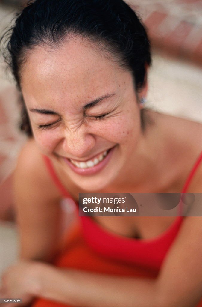 WOMAN LAUGHING, EYES SHUT, PORTRAIT