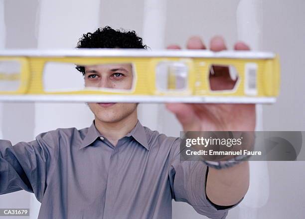 Man Using Level 1,710 Level Tool Close Up Stock Photos, High-Res Pictures, and Images ...