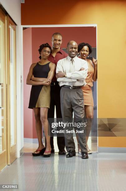 four business colleagues in doorwat, portrait - seth stock pictures, royalty-free photos & images