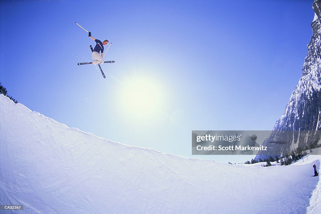 Snowboard skier in mid-air