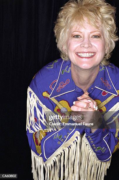 mature woman wearing western shirt, portrait - country and western fotografías e imágenes de stock