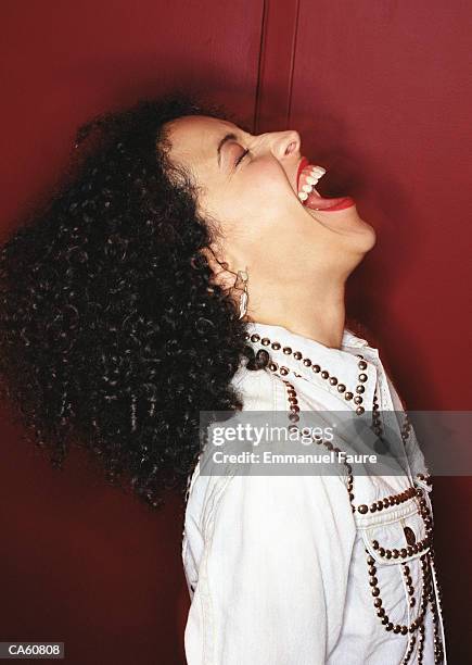 young woman laughing, profile - emmanuel stock pictures, royalty-free photos & images