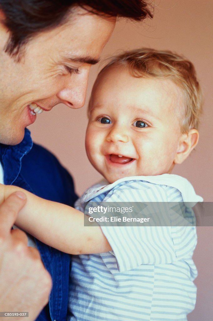 Father and baby (9months), portrait