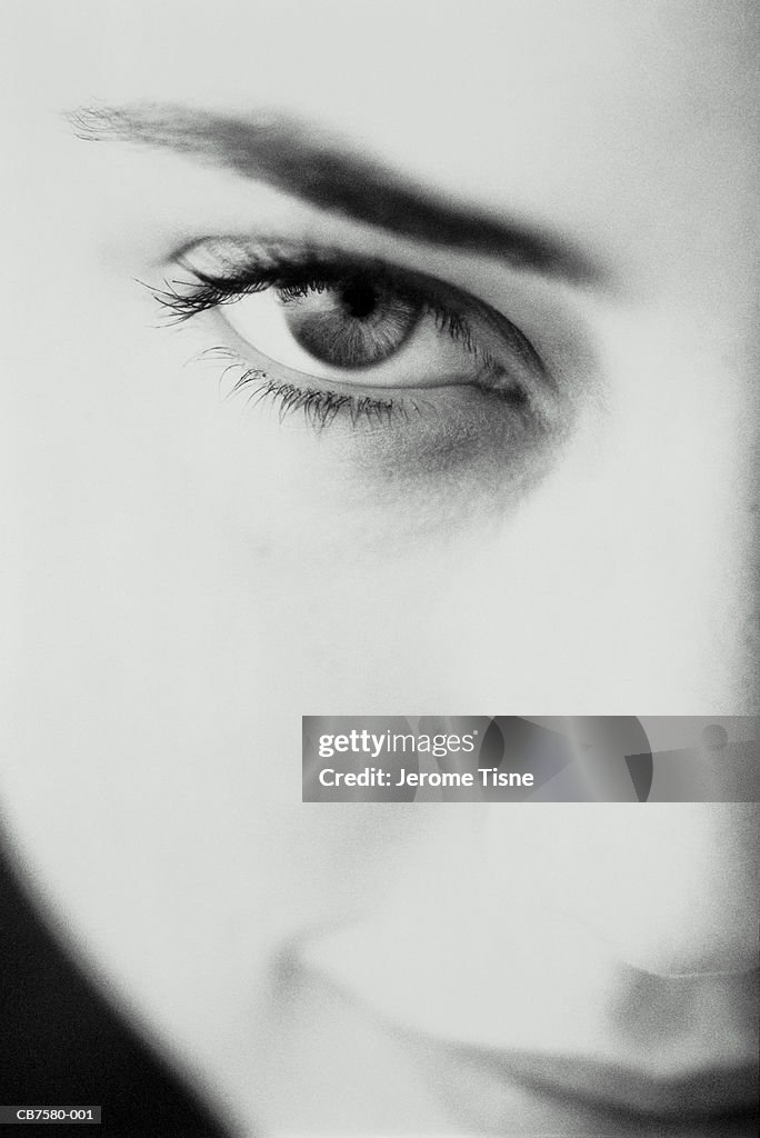 Young woman's face, close-up (B&W)