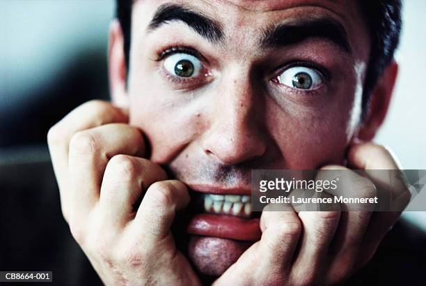 man with scared expression, close-up - terrified stock pictures, royalty-free photos & images