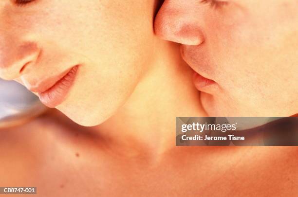 young couple, man kissing woman's neck, close-up - mouths kissing bildbanksfoton och bilder
