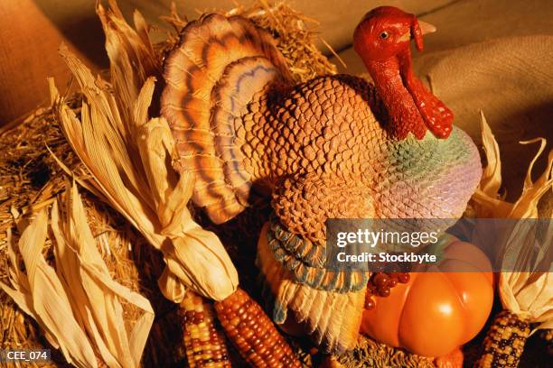 ceramic turkey surrounded by harvest vegetables - maíz criollo fotografías e imágenes de stock