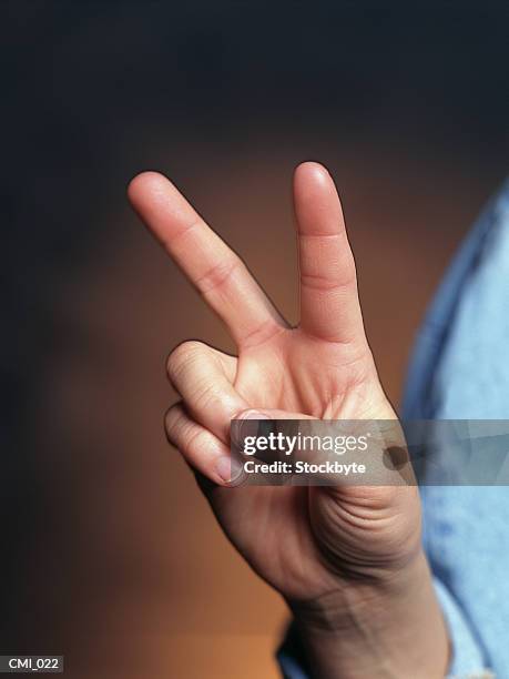 1,079 Making V Sign Stock Photos, High-Res Pictures, and Images - Getty ...