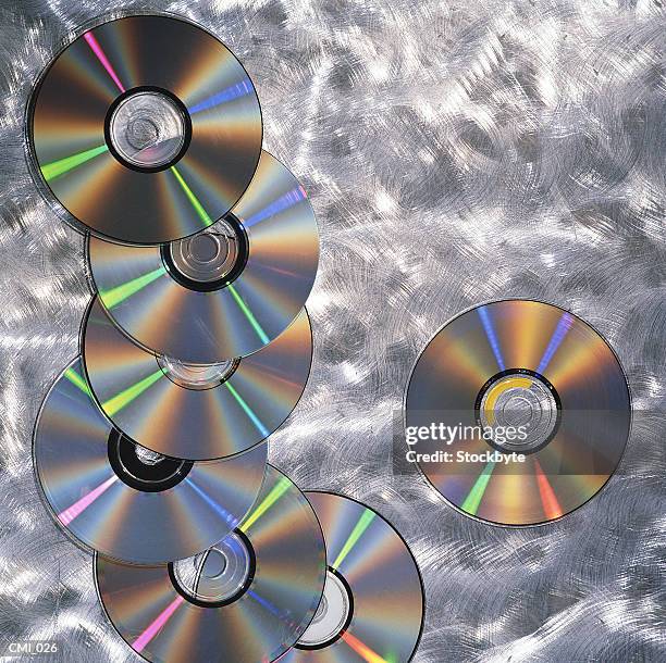 compact discs scattered against luminous background - rom above stock pictures, royalty-free photos & images