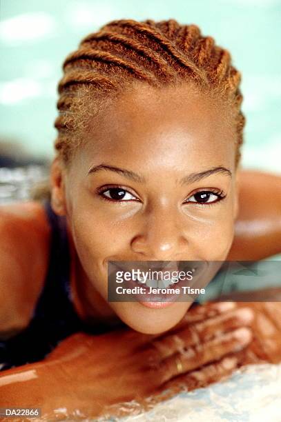 young woman in swimming pool, potrait, high section, close-up - cornrows stock pictures, royalty-free photos & images