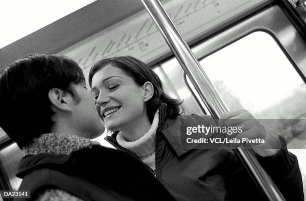 couple on train, close-up, high-section (b&w) - leila stock pictures, royalty-free photos & images