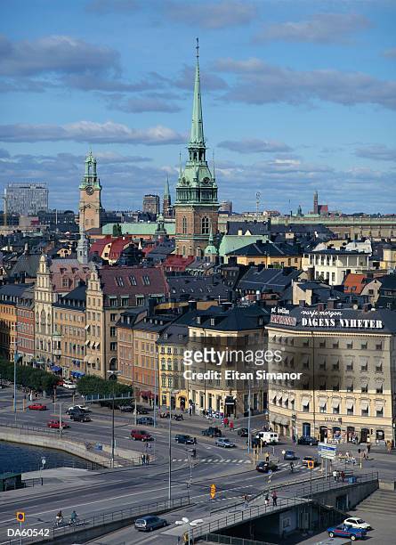sweden, stockholm, gamla stan, cathedral rising over cityscape - contea di stoccolma foto e immagini stock