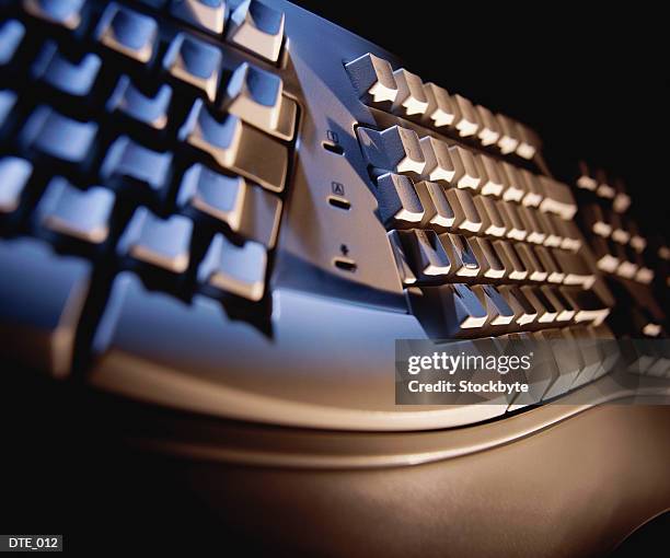 ergonomic computer keyboard - ergonomic keyboard stock pictures, royalty-free photos & images