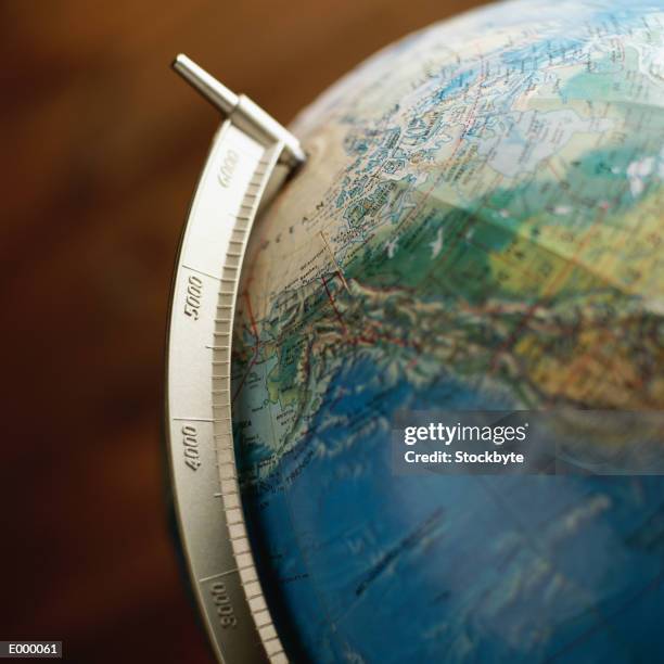 globe showing north america, detail - schreibtischspielzeug stock-fotos und bilder