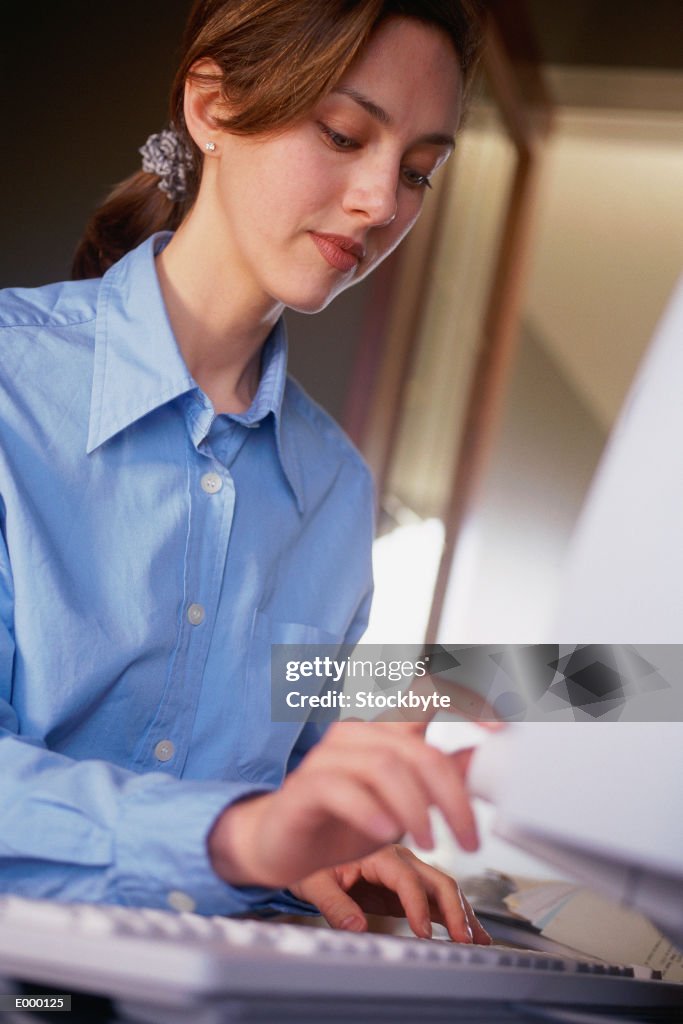 Woman Using Computer High-Res Stock Photo - Getty Images