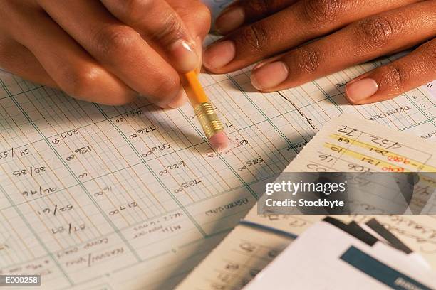 hand erasing entry from spreadsheet - data entry error stock pictures, royalty-free photos & images