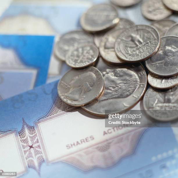 us coins on top of share certificates - moeda de dez cents - fotografias e filmes do acervo