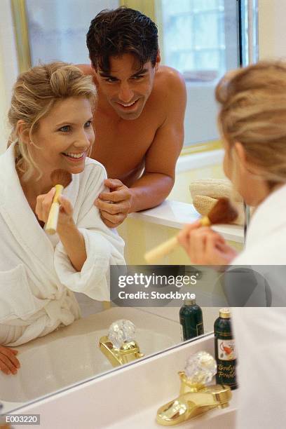 couple getting ready for the day - blusher brush stock pictures, royalty-free photos & images