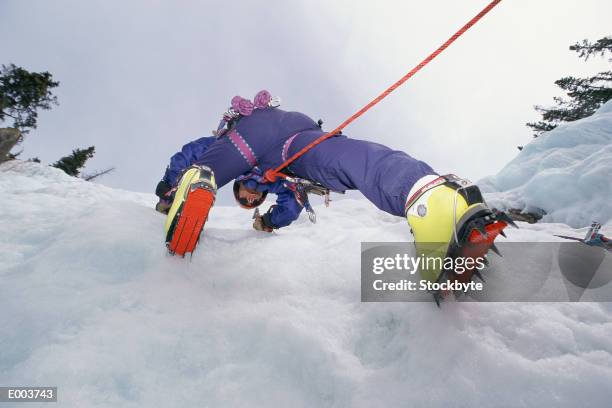 person ice climbing - crampon stock pictures, royalty-free photos & images