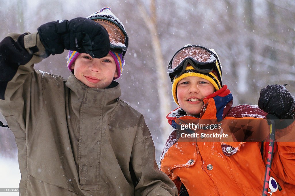 Boys in snowfall