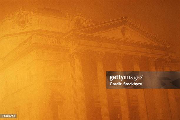 building with columns with an orange and hazy cast - cast of amcs low winter sun q a with art house convergence stockfoto's en -beelden