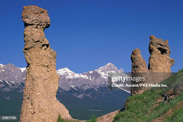 hoodoos with rundle range, banff - outcrop stock pictures, royalty-free photos & images