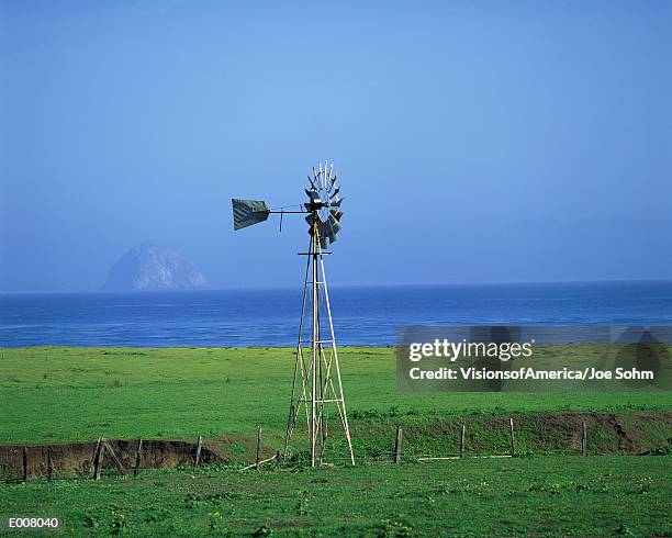 windmill on pacific coast, california - pacific war stock-fotos und bilder