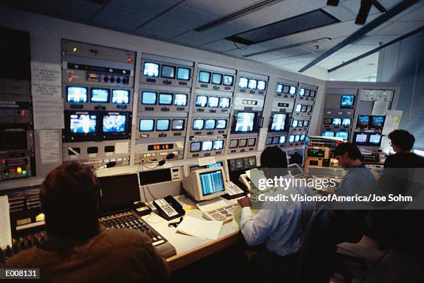 people in control room. - pressroom imagens e fotografias de stock