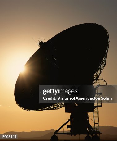 Silhouetted array/satellite dish Silhouetted array/satellite dish