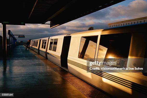 high-speed train in afternoon sun - tgv stock pictures, royalty-free photos & images