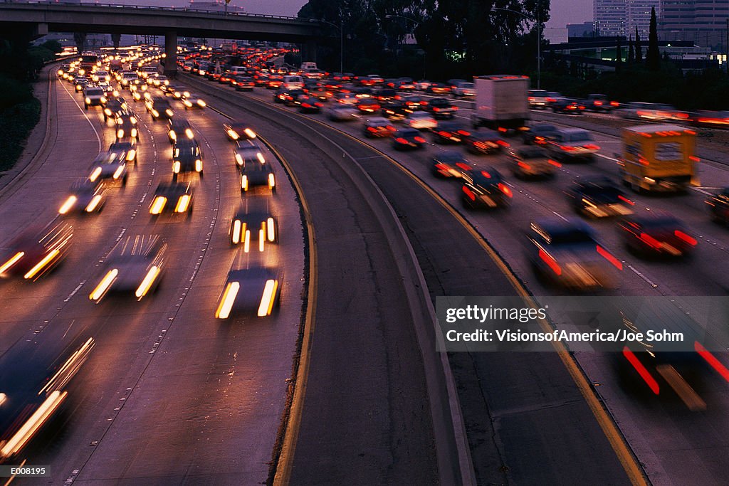 Heavy traffic on freeway at twilight