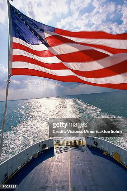 american flag waving on ship - american flag ocean stock pictures, royalty-free photos & images