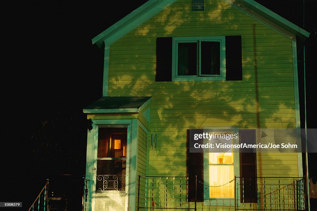 Lit house at night