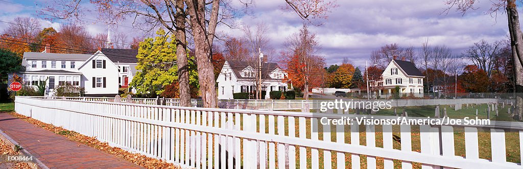 White fence and homes in Maine