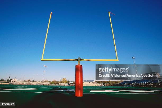 goal posts on football field - football goal post stock pictures, royalty-free photos & images