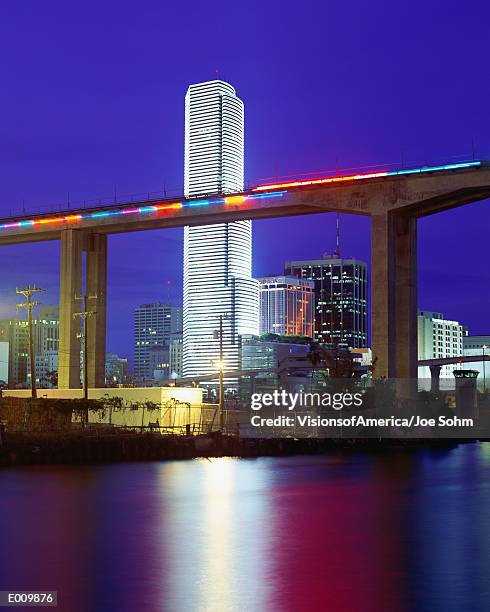 miami metro rail with city beyond, florida - neon joe stock pictures, royalty-free photos & images