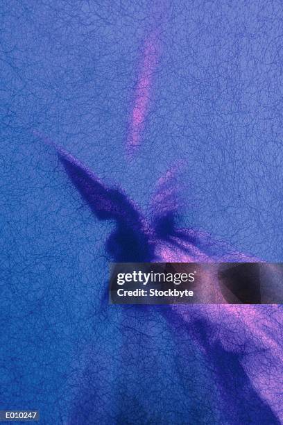 low angle view of angel statue - magic statue stock pictures, royalty-free photos & images