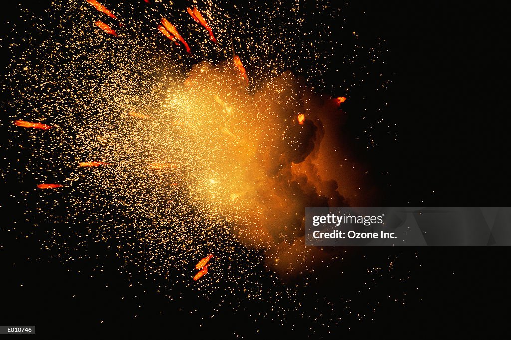Exploding Fireball With Shower Of Sparks High-Res Stock Photo - Getty ...