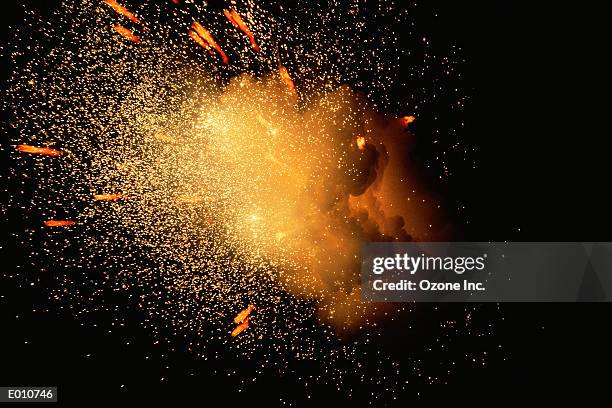 exploding fireball with shower of sparks - sparks bildbanksfoton och bilder