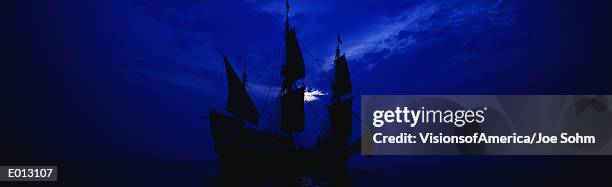 dark sailing ship - ominous moon stock pictures, royalty-free photos & images