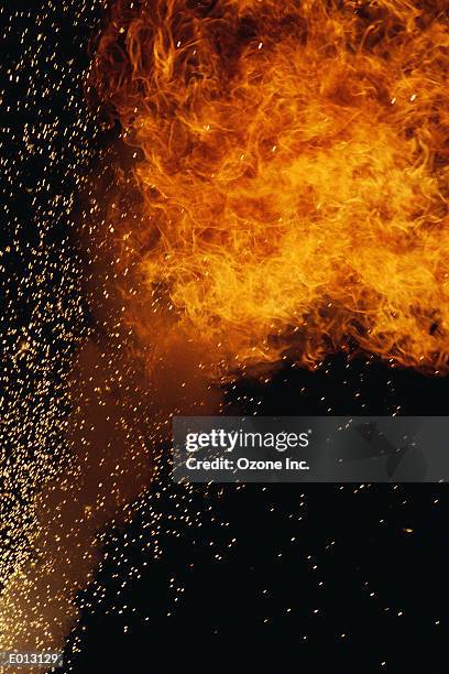 fiery explosion with sparks - sparks bildbanksfoton och bilder