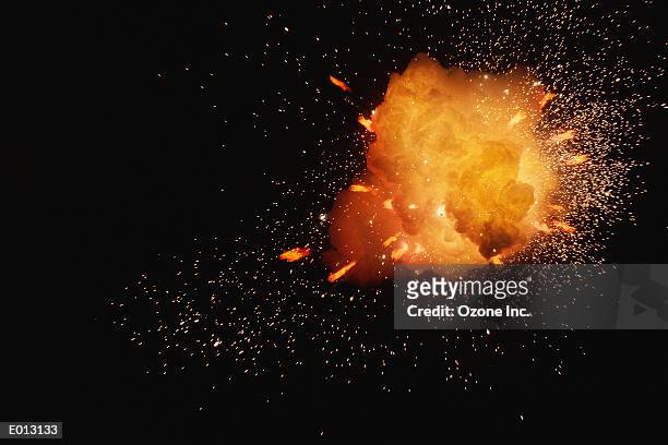 sparks flying from explosion - sparks fotografías e imágenes de stock