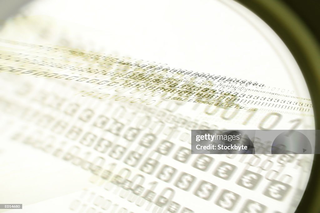 Blurred binary and money symbols in green