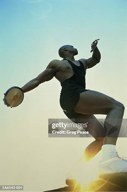 Young Man Throwing Discus Photos and Premium High Res Pictures - Getty ...