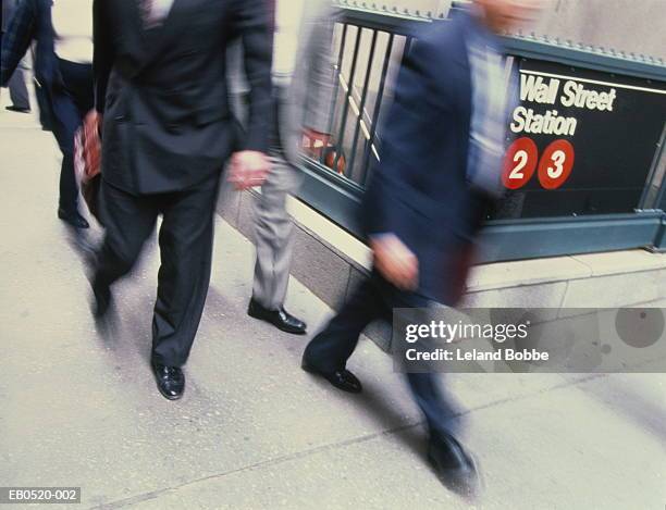 usa, new york,new york city, people walking past wall st. subway stop - wall street lower manhattan imagens e fotografias de stock